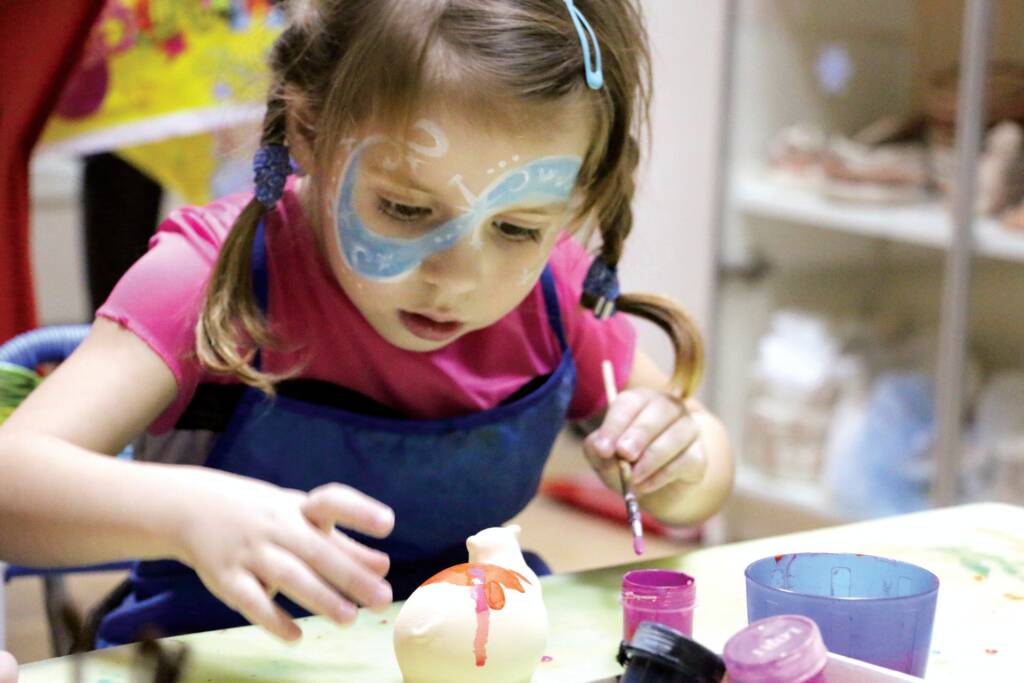 children playing face painting